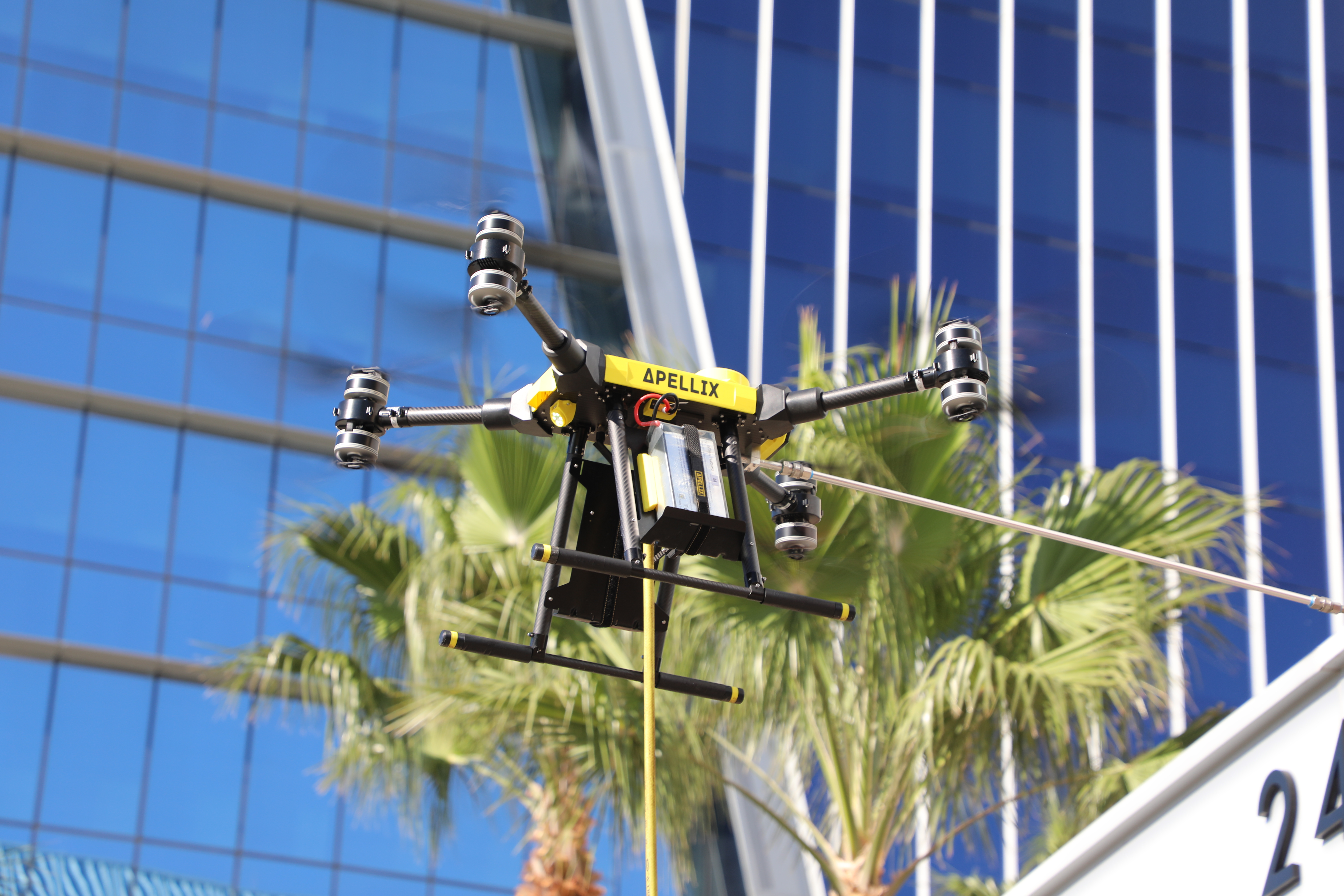 Apellix drone washing building windows